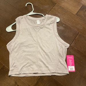 Purple crop tank top with an open back